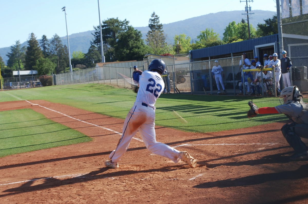 Junior Derek Eltherington nails a pitch in the team’s 9–0 win against Gunn High School. The Eagles hope to match their success in a league game against Milpitas High School.